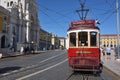 Red tram on a square Praca de Comercio in Lisbon, Portugal Royalty Free Stock Photo